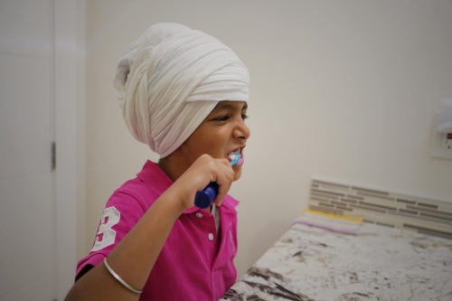 Wellness Influencers Discuss Integration of Electric Toothbrushes into Family Routines