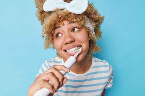Electric Toothbrush Vibrations and Tooth Safety: Evidence-Based Insights